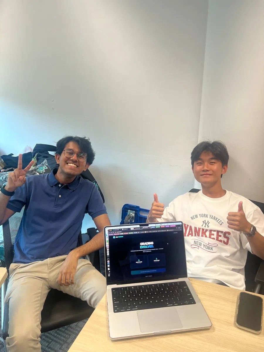 Two lodgers showing off their finished project